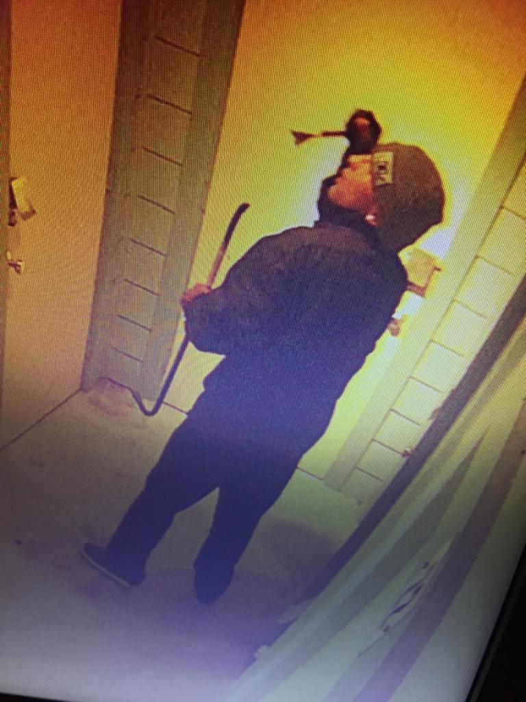 Suspect #2 wearing a beanie